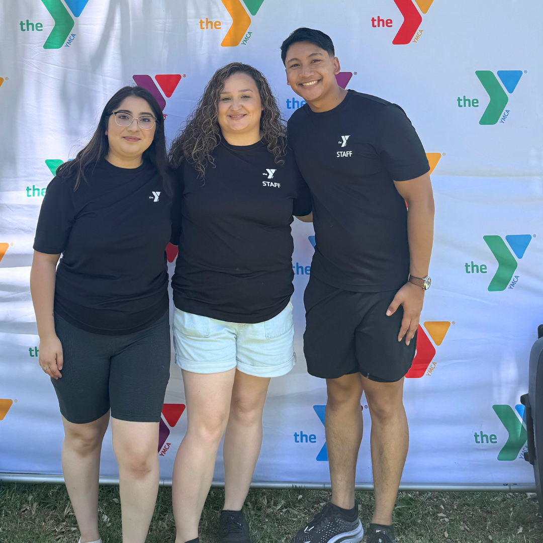 Stephani (right), Briana (center), and Brandon (left) pose together at the graduation.